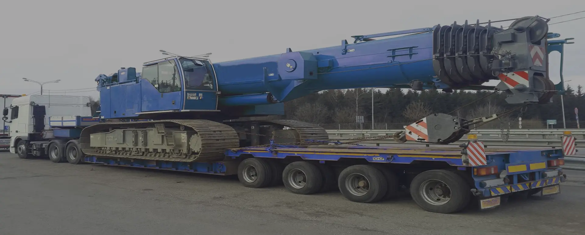 Онлайн калькулятор для расчета цены на перевозку тралом мостовых и гусеничных кранов по России из Атажукино